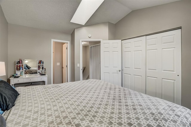 3618 Queen Anne Way, Colorado Springs, CO 80917 - bedroom featuring a closet, a textured ceiling, and lofted ceiling