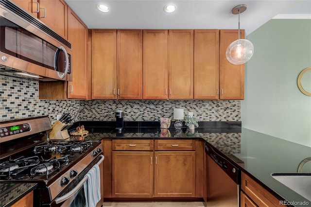 1975 N Grant St Unit 509, Denver, CO 80203 - kitchen featuring appliances with stainless steel finishes, a sink, tasteful backsplash, recessed lighting, and pendant lighting