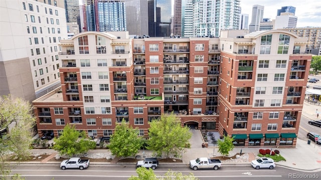 1975 N Grant St Unit 509, Denver, CO 80203 - view of apartment building / complex featuring a city view