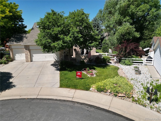 12705 Kalamath Ct, Westminster, CO 80234 - obstructed view of property with driveway and a garage