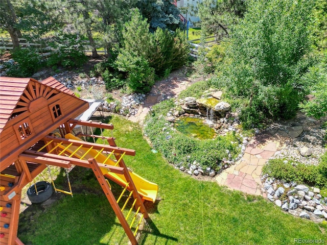 12705 Kalamath Ct, Westminster, CO 80234 - view of green lawn featuring a playground and a small pond