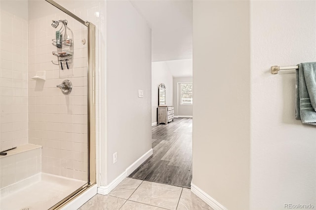 12705 Kalamath Ct, Westminster, CO 80234 - full bathroom with a shower stall and baseboards