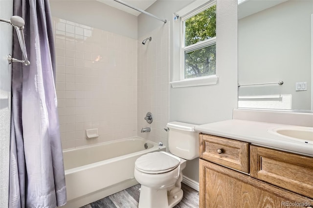 12705 Kalamath Ct, Westminster, CO 80234 - full bath featuring shower / bath combo with shower curtain, wood finished floors, and vanity