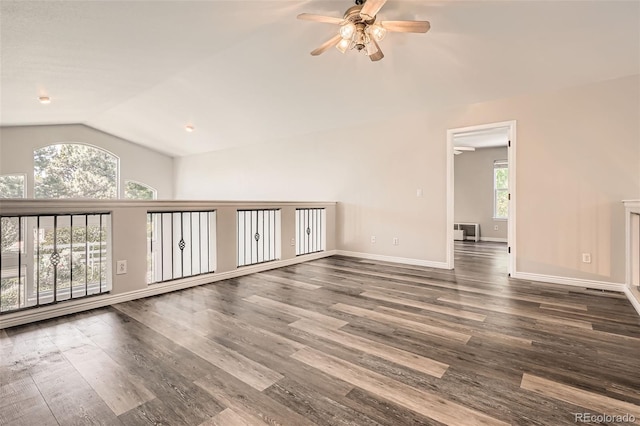 12705 Kalamath Ct, Westminster, CO 80234 - spare room featuring vaulted ceiling, a ceiling fan, and wood finished floors