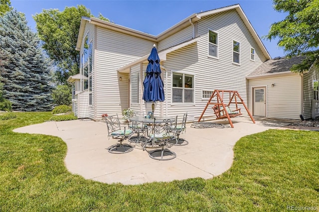 12705 Kalamath Ct, Westminster, CO 80234 - back of house featuring a patio and a lawn