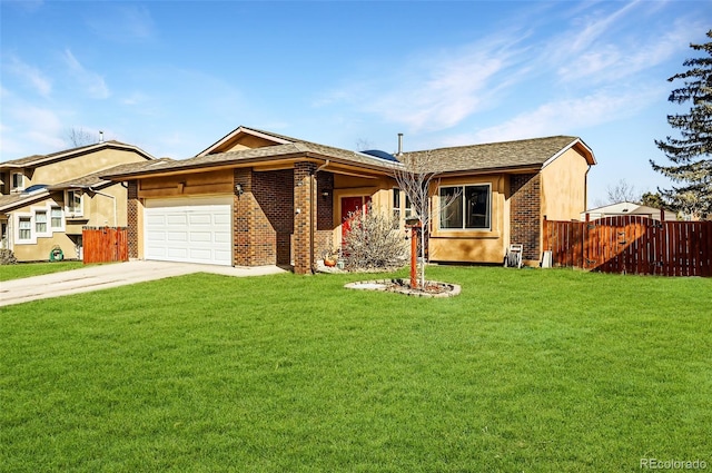 ranch-style home with a garage and a front lawn