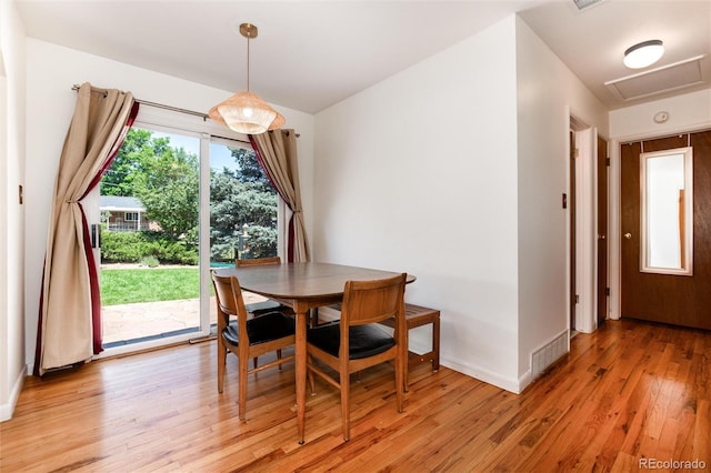 5067 S Mabre Ct, Littleton, CO 80123 - dining space with light wood finished floors and attic access