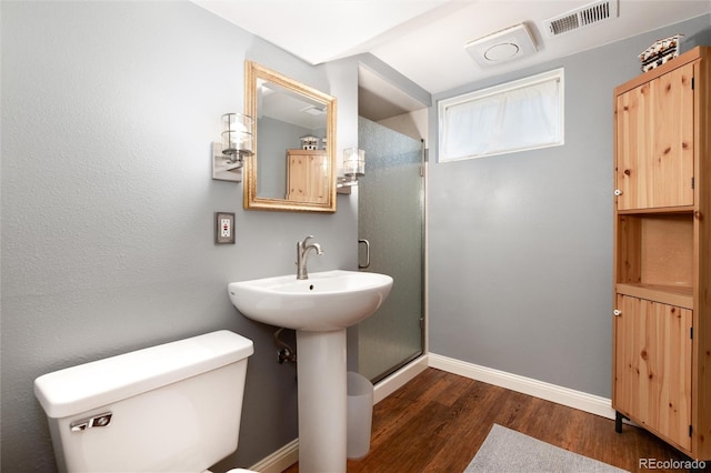 5067 S Mabre Ct, Littleton, CO 80123 - full bathroom with wood finished floors and a shower stall