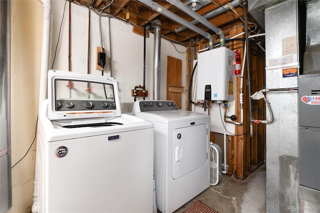 5067 S Mabre Ct, Littleton, CO 80123 - laundry room with tankless water heater, washing machine and clothes dryer, and heating unit