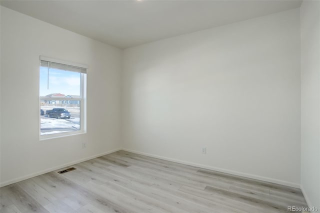 empty room featuring light hardwood / wood-style floors