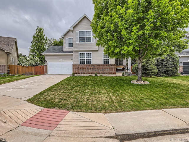 8010 Raspberry Dr, Frederick, CO 80504 - view of front of house featuring brick siding, driveway, and a garage