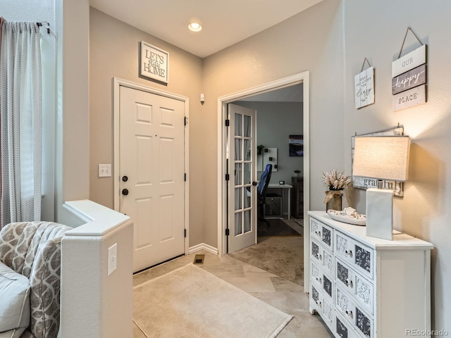8010 Raspberry Dr, Frederick, CO 80504 - entrance foyer featuring light colored carpet and recessed lighting