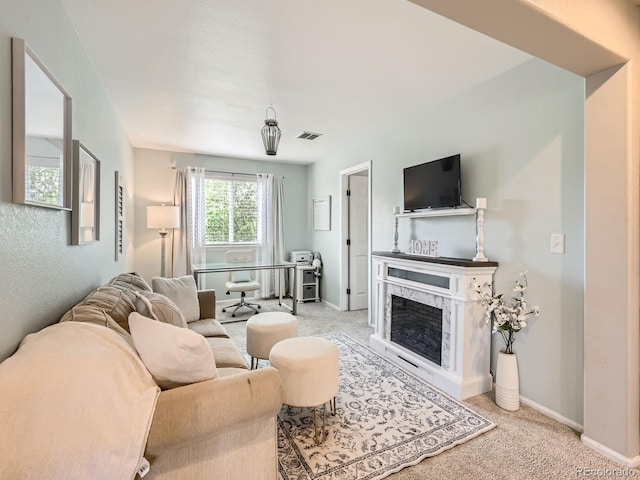 8010 Raspberry Dr, Frederick, CO 80504 - living area with light colored carpet, baseboards, and a premium fireplace