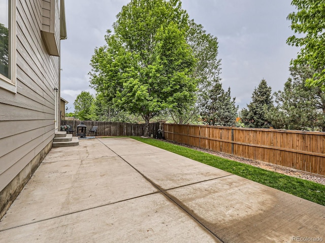 8010 Raspberry Dr, Frederick, CO 80504 - fenced backyard with a patio area