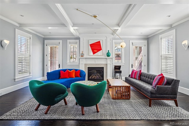 201 S Lafayette St, Denver, CO 80209 - living area featuring coffered ceiling, healthy amount of natural light, dark wood-type flooring, a glass covered fireplace, and ornamental molding