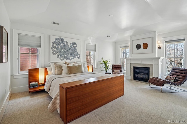 201 S Lafayette St, Denver, CO 80209 - carpeted bedroom with a fireplace and baseboards