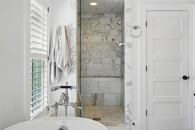201 S Lafayette St, Denver, CO 80209 - bathroom featuring a shower stall, a bathtub, and healthy amount of natural light