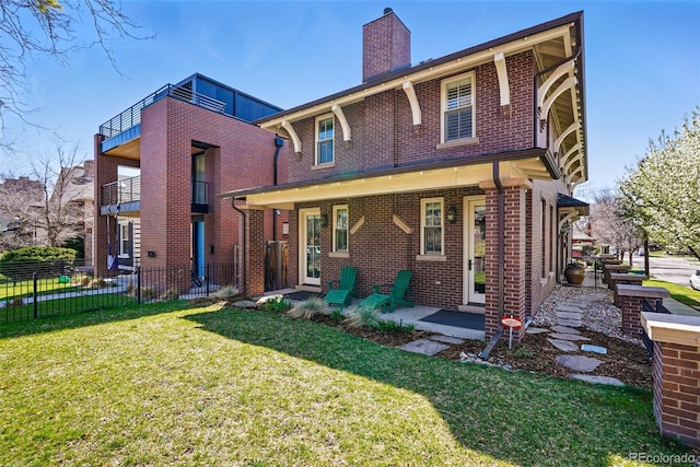 201 S Lafayette St, Denver, CO 80209 - view of front of house with brick siding and a chimney