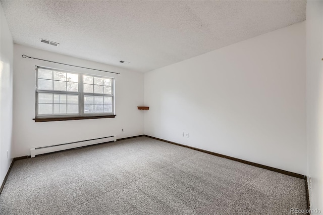 carpeted spare room featuring baseboards, visible vents, a textured ceiling, and baseboard heating