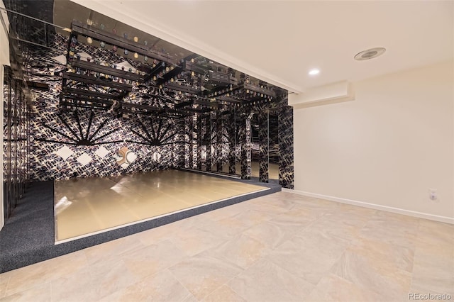 wine room featuring baseboards