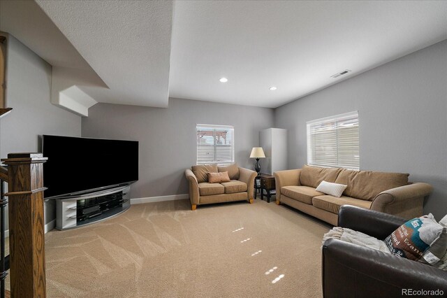 12420 Verbena St, Thornton, CO 80602 - living area featuring carpet and recessed lighting