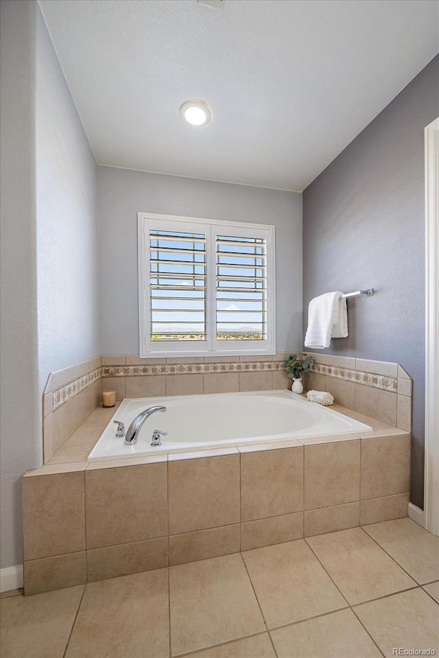 12420 Verbena St, Thornton, CO 80602 - full bath with a garden tub and tile patterned floors