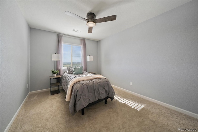 12420 Verbena St, Thornton, CO 80602 - bedroom with light carpet and a ceiling fan