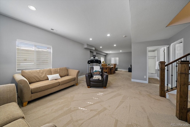 12420 Verbena St, Thornton, CO 80602 - carpeted living area featuring recessed lighting and stairs