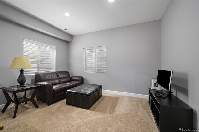 12420 Verbena St, Thornton, CO 80602 - living area with light colored carpet and recessed lighting
