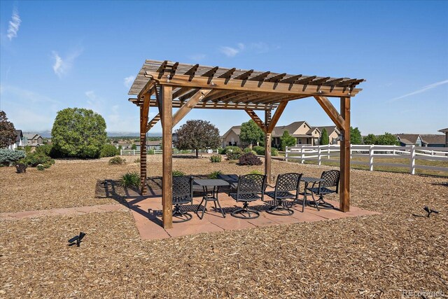 12420 Verbena St, Thornton, CO 80602 - view of yard featuring a pergola and a patio area