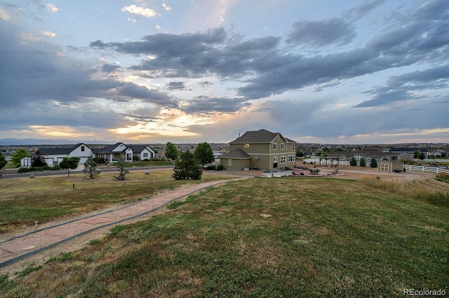 12420 Verbena St, Thornton, CO 80602 - yard at dusk with a yard