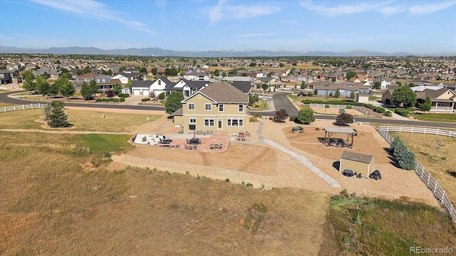 12420 Verbena St, Thornton, CO 80602 - aerial perspective of suburban area featuring mountains