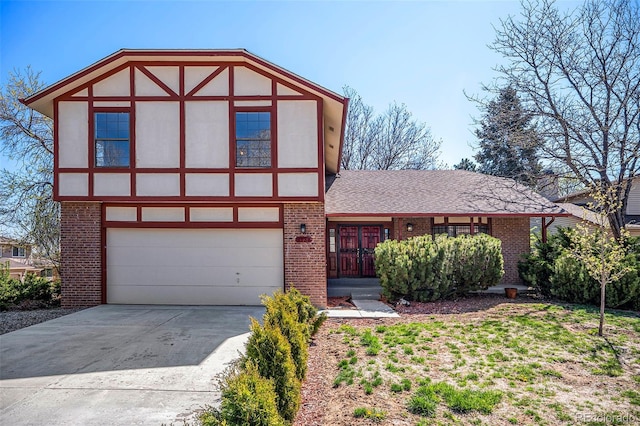 tudor-style house with a garage