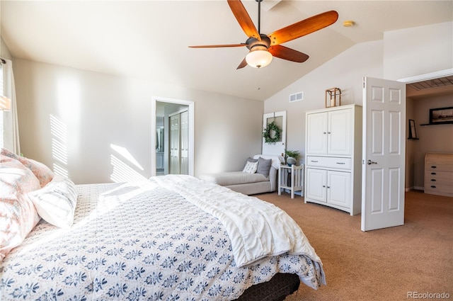 bedroom with lofted ceiling, light carpet, and ceiling fan