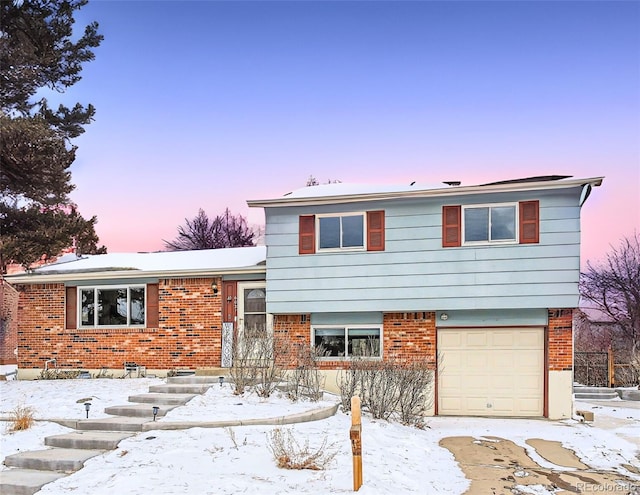 tri-level home featuring a garage