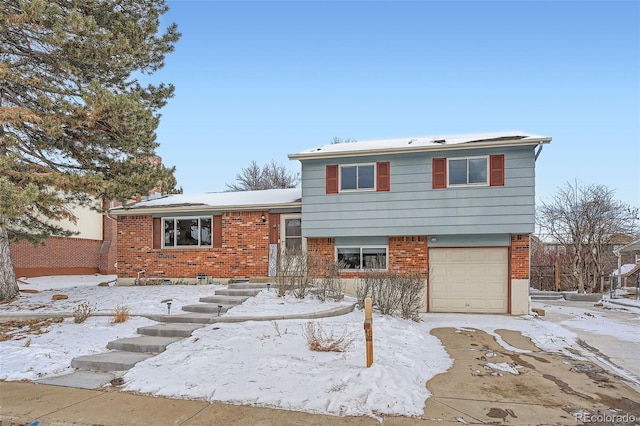 tri-level home featuring a garage