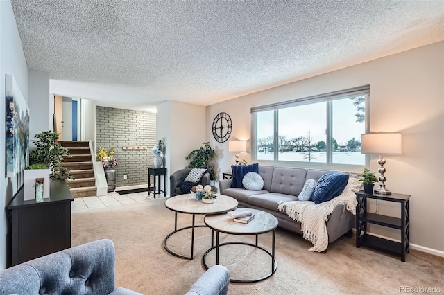 living room with a textured ceiling, light carpet, and a water view