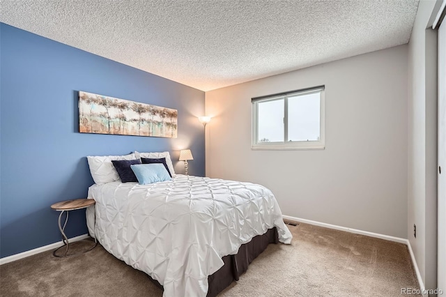 carpeted bedroom with a textured ceiling