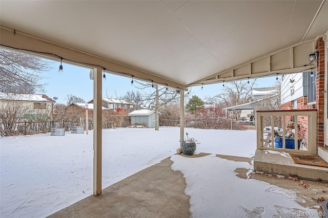 view of yard covered in snow