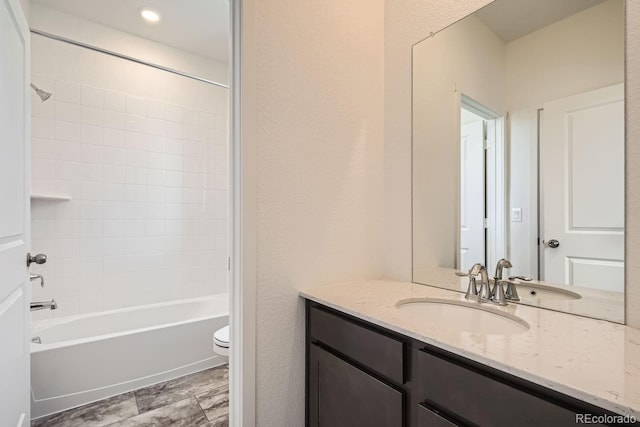 full bathroom with vanity, toilet, and tub / shower combination