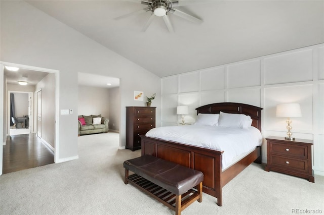 9135 Argentine Pass Trl, Colorado Springs, CO 80924 - bedroom with carpet flooring, vaulted ceiling, and a decorative wall