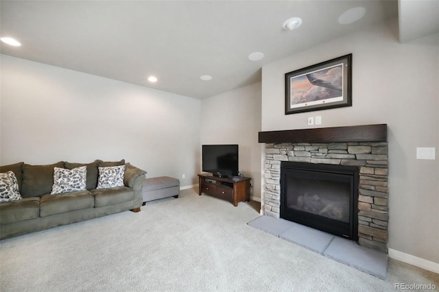 9135 Argentine Pass Trl, Colorado Springs, CO 80924 - living room with carpet floors, a stone fireplace, and recessed lighting
