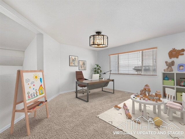 home office featuring a chandelier, baseboards, and carpet