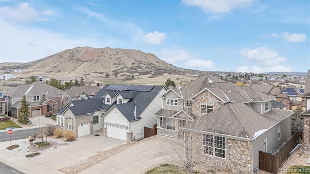 property view of mountains featuring a residential view