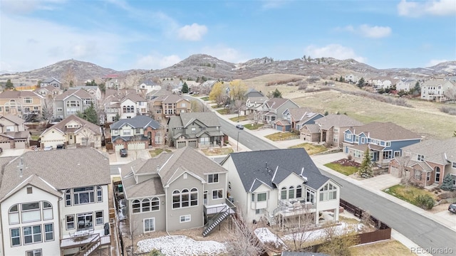 aerial view featuring a mountain view and a residential view