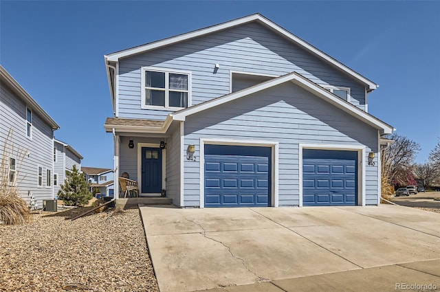 442 Stardust Ct, Dacono, CO 80514 - traditional home with central AC unit, a garage, and concrete driveway