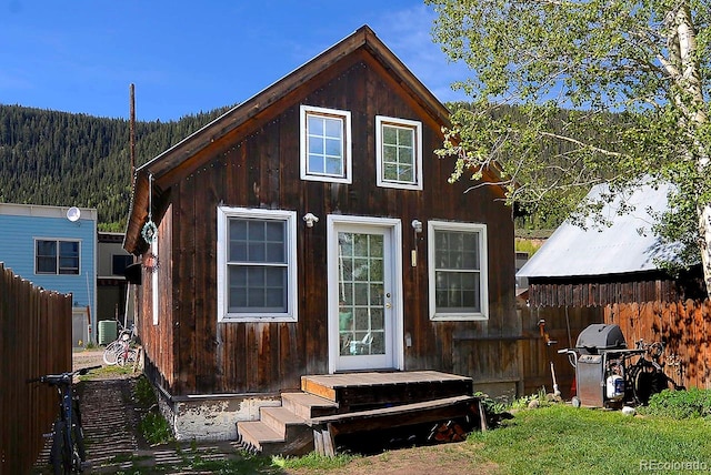 view of front facade with central AC unit