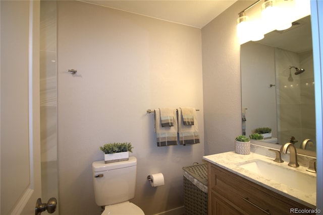 full bath with toilet and vanity