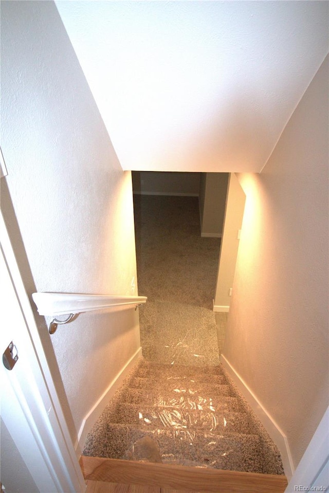 stairway with baseboards