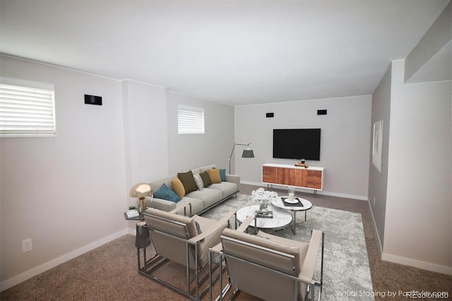 living area with carpet and baseboards